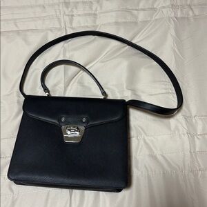 Salvatore Ferragamo Black Interior with Silver Logo Plate